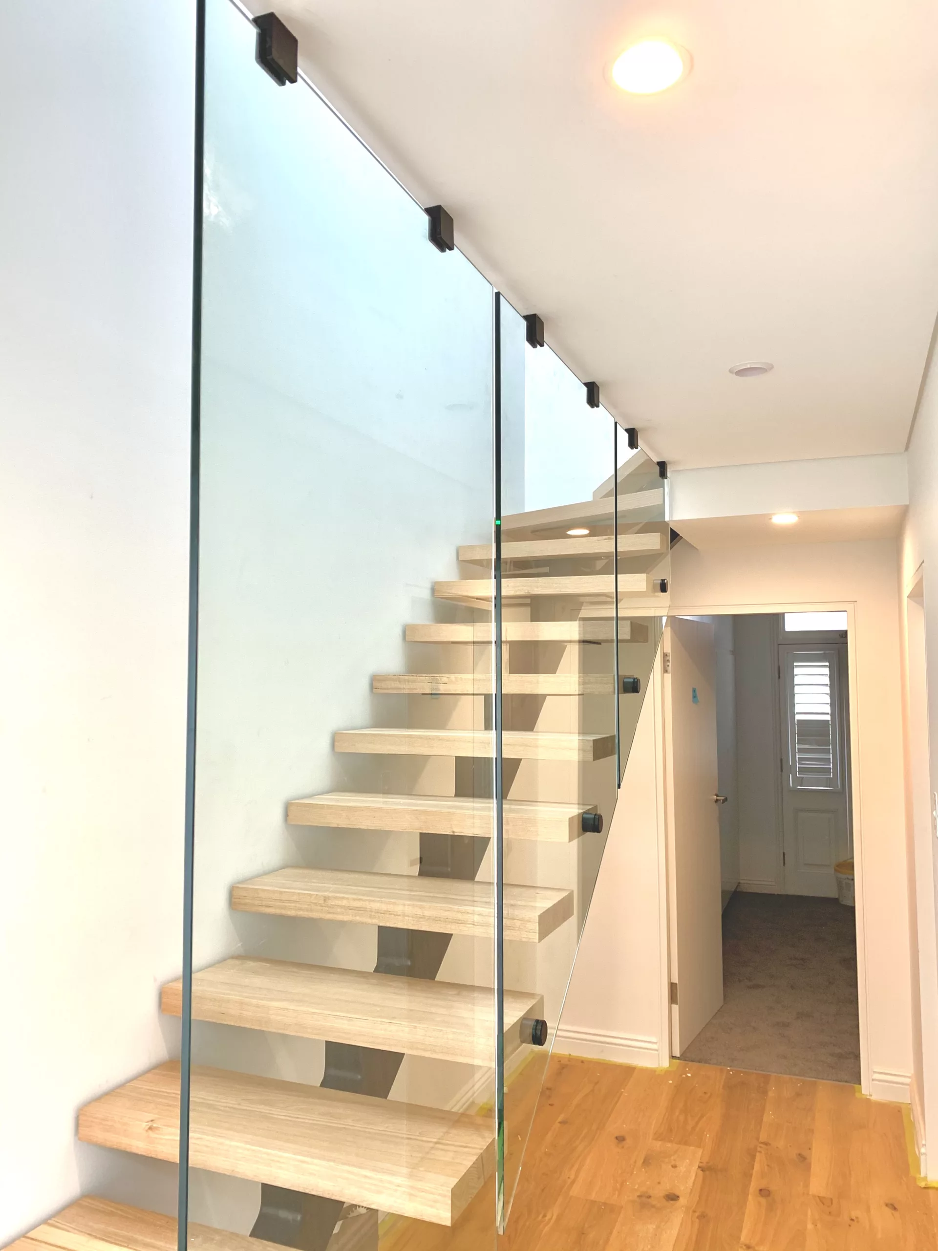 Full height stair glass balustrade
