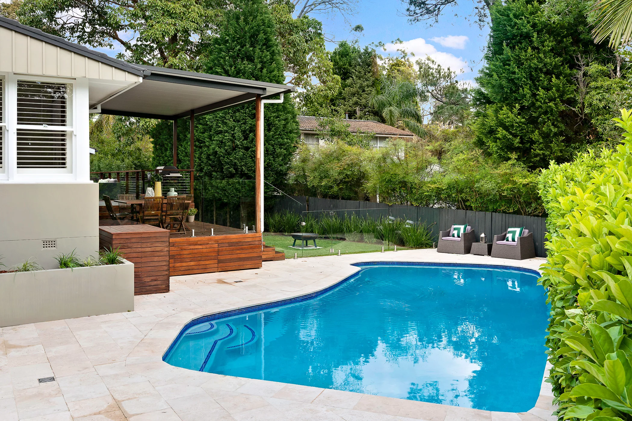 Frameless glass pool fence with soft close gate hinges