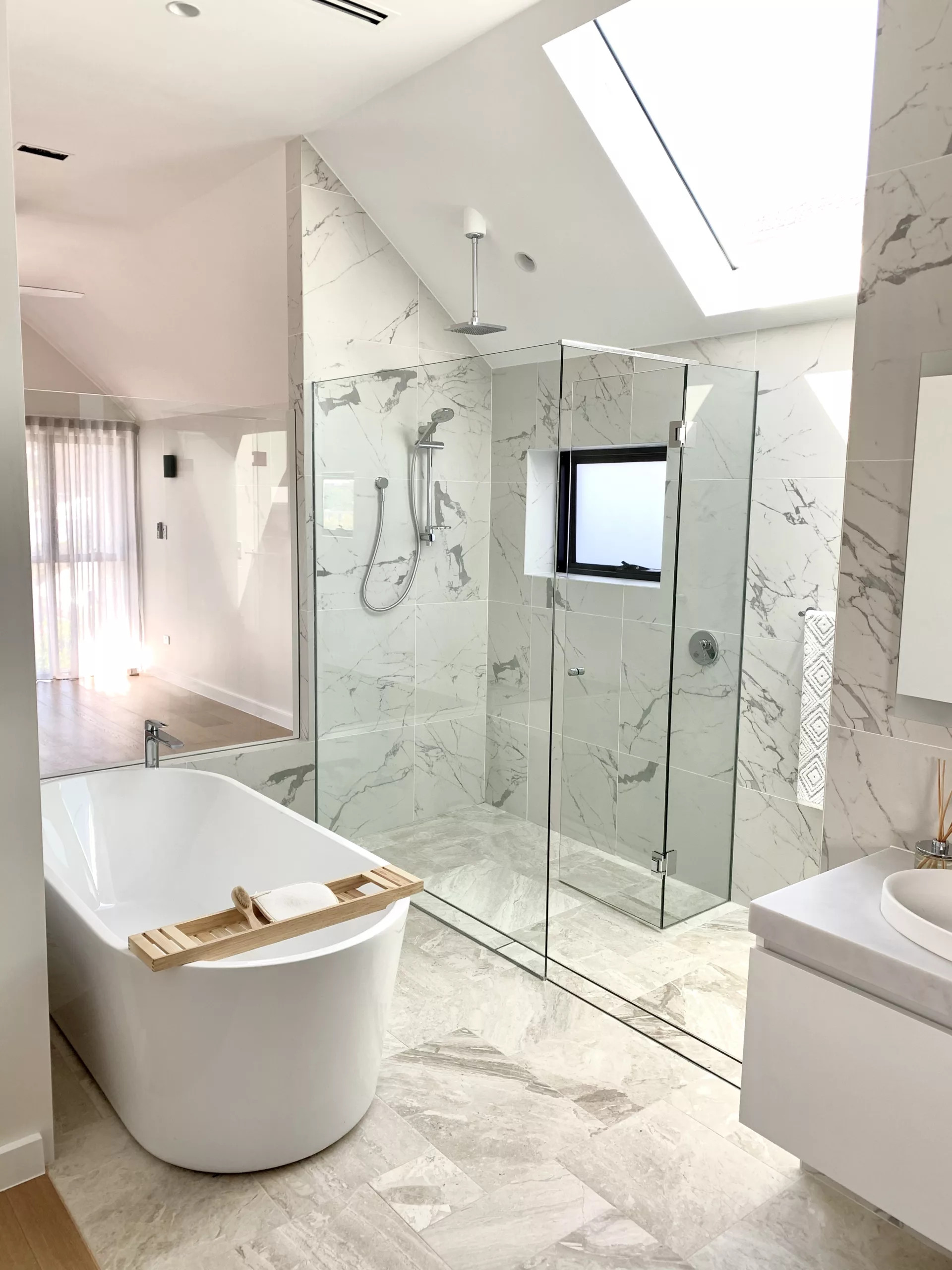 Large frameless glass corner shower screen