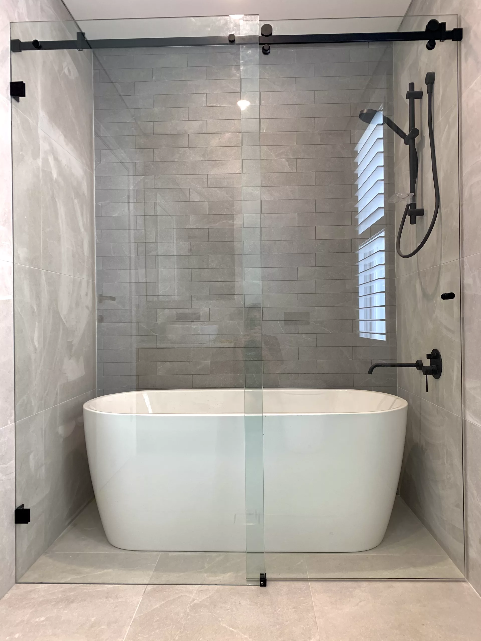 Glass wall to wall slider shower screen Glass wall to wall slider shower screen